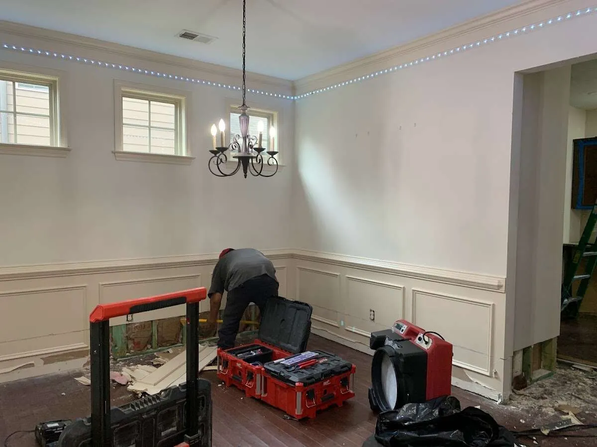 Restoration technician with professional equipment in Readington